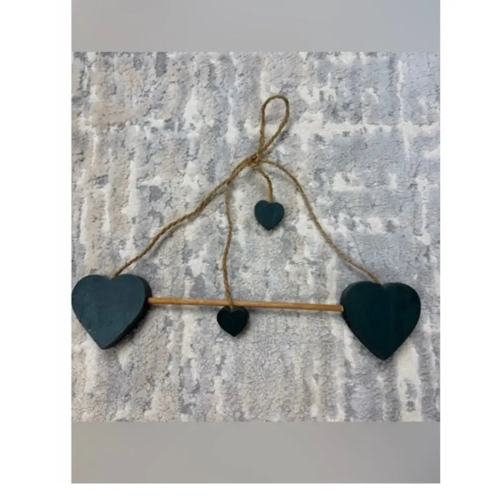Vintage green metal heart-shaped wall sconce & green wood hearts 1990s